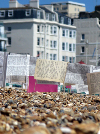 Flags on a pebble beach